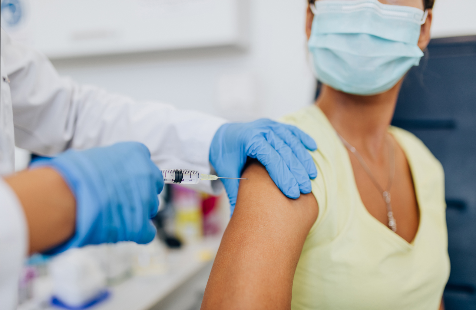 Woman Receiving Flu Vaccination